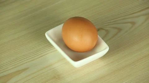 Egg in saucers Stock Footage 51306172