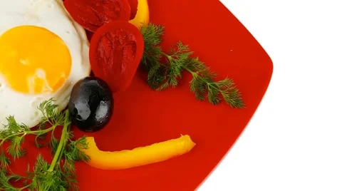 Egg served on red dish 스톡 동영상 57917257