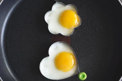 Egg shape cooking Stock Photos
