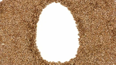Egg shape in flax seeds, replace eggs in vegetarian recipe, eggless cooking Video stock 138890877