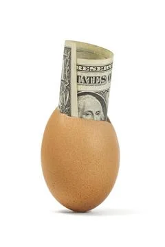Egg shell with one dollar bank note Stock Photos