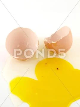 Egg shells and yolk Stock Photos