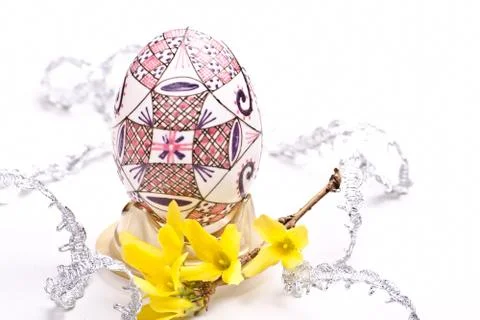 Egg with silver ribbon Stock Photos