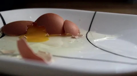 Egg Smashing On Impact Stock Footage 64999132