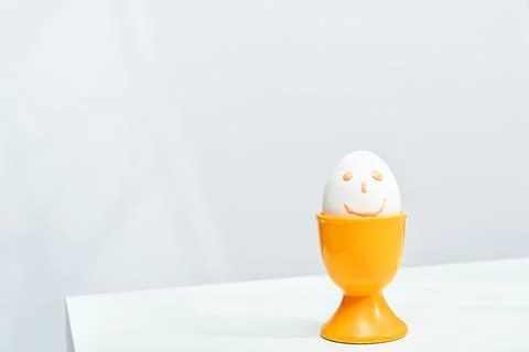 An egg with smiling face, easter concept Stock Photos
