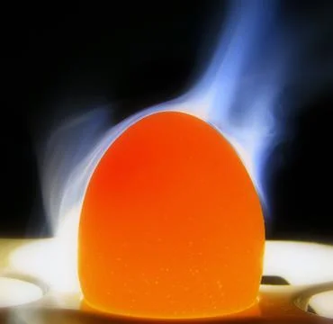 Egg with smoke with black background Stock Photos