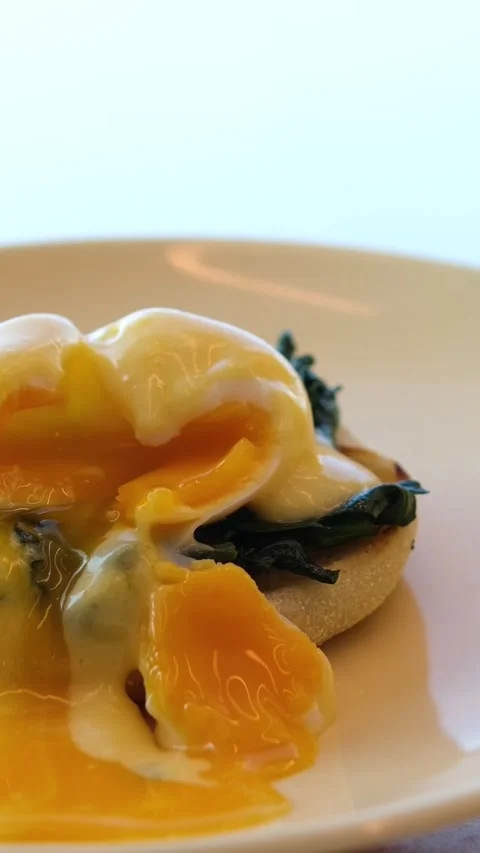 Egg spinach breakfast Guy Eating Meal Full English Breakfast Bacon Poached Eggs Stock Footage 317713167