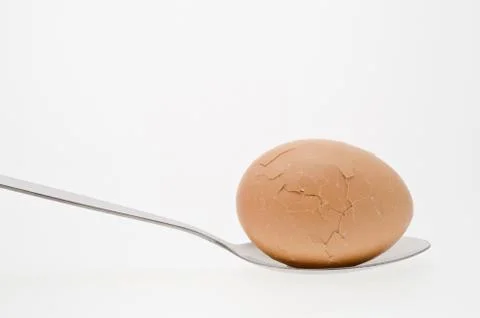 Egg on spoon Foto stock