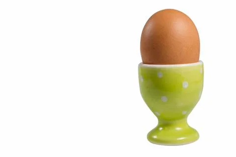 Egg on a stand, isolate on white background Foto stock
