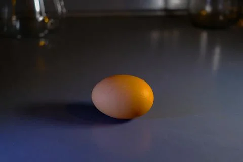 Egg standing on table Stock Photos