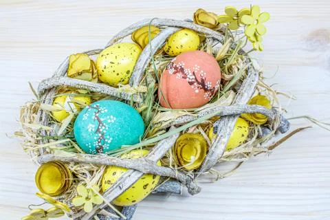 Egg on straw Stock Photos