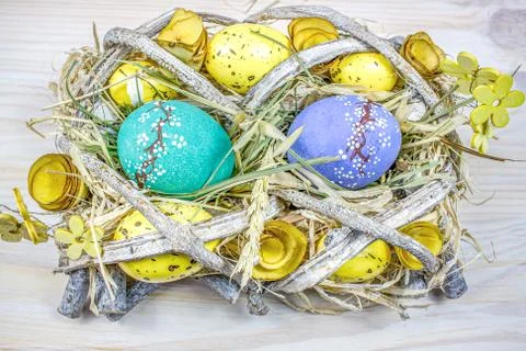 Egg on straw Stock Photos