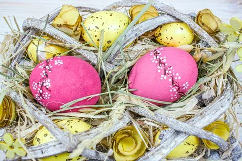 Egg on straw Stock Photos