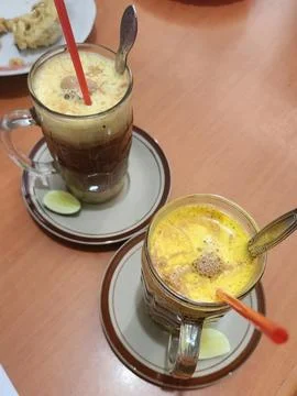 Egg tea, or also known as talua tea, is a traditional drink Stock Photos