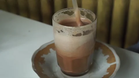 Egg tea ( Teh Talua ) Stock Footage 284321928