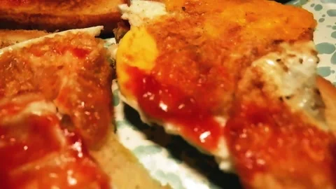 An egg toast with egg and hot sauce Video stock 278509860