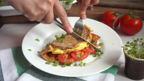 Egg toast with whole grain bread and tomatoes, healthy egg sandwich Stock Footage 131856081