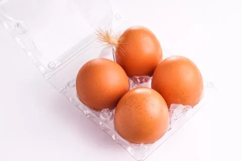 Egg tray with four egg Stock Photos