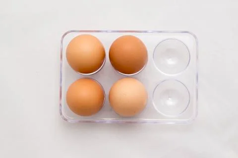 Egg Tray, Four Eggs, Six Eggs Minus Two Stock Photos