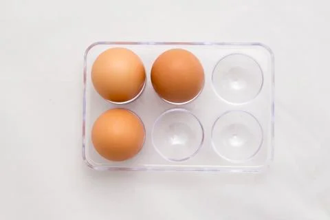 Egg Tray, Three Eggs, Six Eggs Minus Three Stock Photos