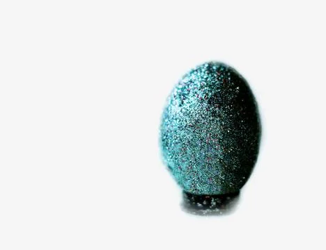 Egg in turquoise sequins Stock Photos