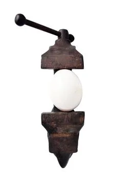 Egg in vise Stock Photos