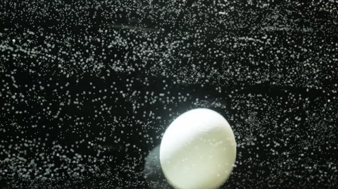 Egg in water Illuminated aquarium, bubbles Stock Footage 61246887