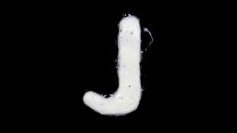 Egg white frying letter J, include two looped 10 seconds duration versions Stock Footage 130800602
