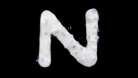 Egg white frying letter N, include two looped 10 seconds duration versions Stock Footage 130801243