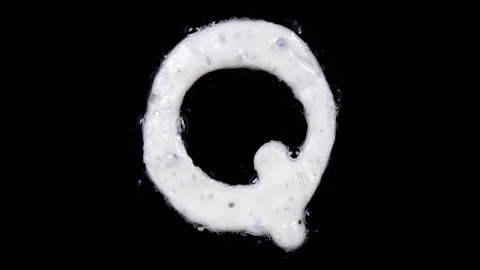 Egg white frying letter Q, include two looped 10 seconds duration versions Stock Footage 130802098