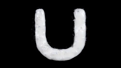 Egg white frying letter U, include two looped 10 seconds duration versions Stock Footage 130802730