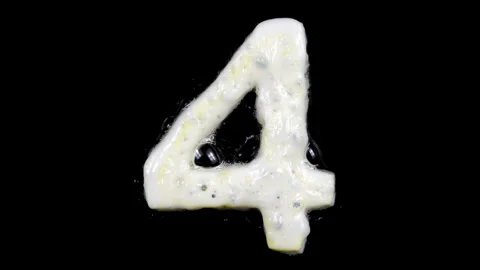 Egg white frying number four, 4, two looped 10 seconds duration versions Stock Footage 130900729
