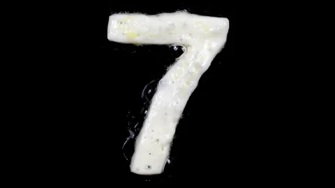 Egg white frying number seven, 7, two looped 10 seconds duration versions Vídeos de archivo 130898598