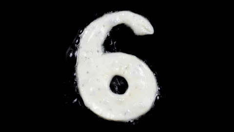 Egg white frying number six, 6, two looped 10 seconds duration versions Stock Footage 130900988