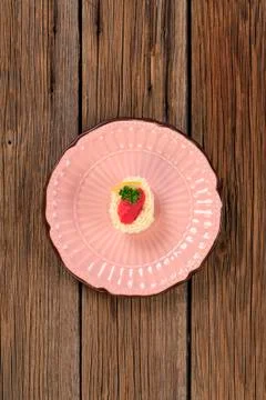 Egg white stuffed with savory spread and red caviar Stock Photos
