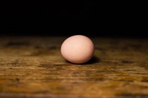 Egg on wooden table 库存照片