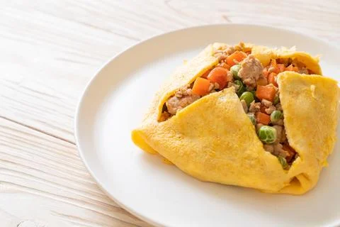 Egg wrap or stuffed egg with minced pork and vegetable Stock Photos