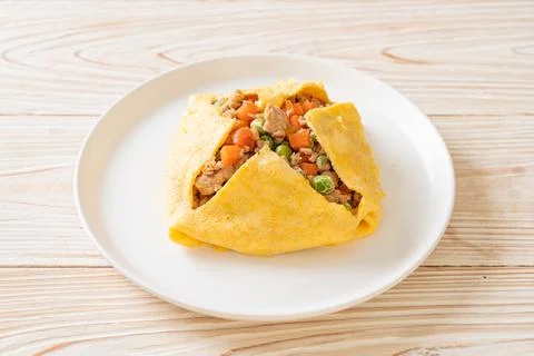 Egg wrap or stuffed egg with minced pork and vegetable Stock Photos