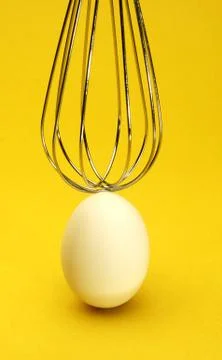 Egg on Yellow Stock Photos