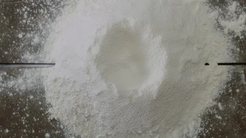 Egg Yolk is Dropping into The Dough Stock Footage 115862674