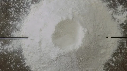 Egg Yolk is Dropping into The Dough Stock Footage 115862712
