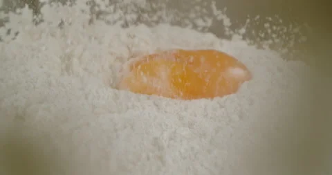 Egg yolk falling into a flour in Super Slow motion 1000 fps 스톡 동영상 161801526