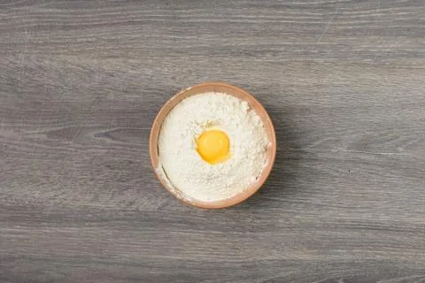 Egg yolk in flour Stock Photos