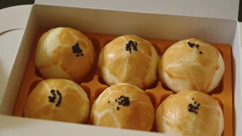 Egg Yolk Pastries in a Gift Box for Mid Autumn Festival Stock Footage 345669899