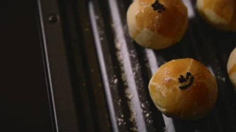 Egg Yolk Pastries Served with Hot Tea for Mid Autumn Festival Stock Footage 345669040