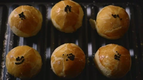 Egg Yolk Pastries Served with Hot Tea for Mid Autumn Festival Stock Footage 345669080