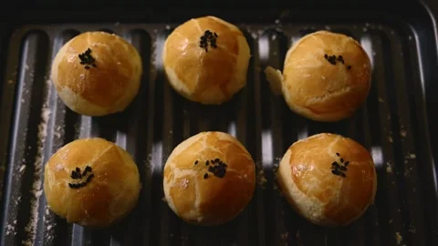 Egg Yolk Pastries Served with Hot Tea for Mid Autumn Festival Stock Footage 345669083