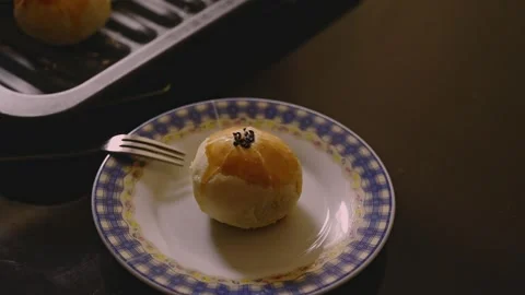 Egg Yolk Pastries Served with Hot Tea for Mid Autumn Festival Stock Footage 345669357