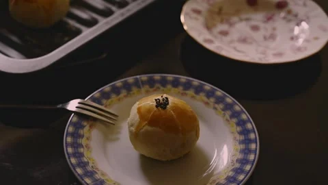 Egg Yolk Pastries Served with Hot Tea for Mid Autumn Festival Stock Footage 345669393