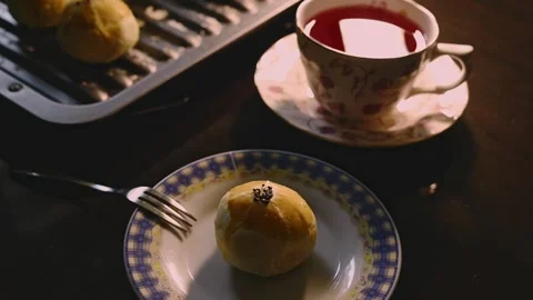 Egg Yolk Pastries Served with Hot Tea for Mid Autumn Festival Stock Footage 345669398